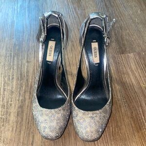 Guess silver, glittery platform high heel shoes 6.5 cheetah print. Adjustable
